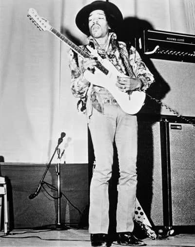 Jimi Hendrix playing guitar at a 1970 show